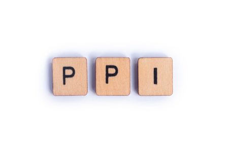 wooden blocks with the letters PPI on them
